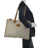 Shopping bag Hermès Kaba in tela beige e pelle naturale - Detail D1 thumbnail