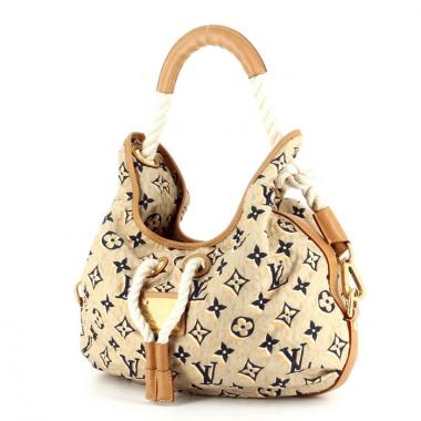 Louis Vuitton Limited edition in monogram canvas and natural leather