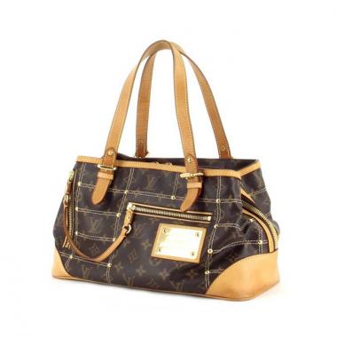 Borsa Louis Vuitton in tela monogram con borchie e pelle naturale