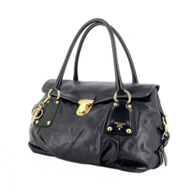Prada in black leather and gold metal hardware