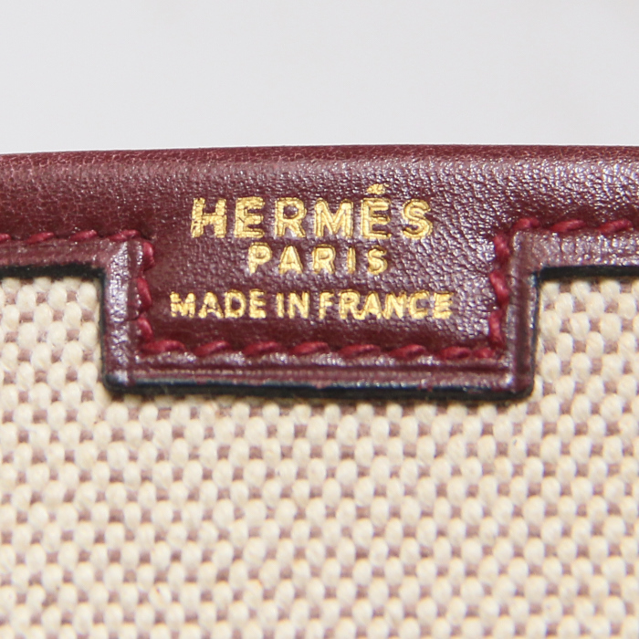 Hermes pochette Jige en toile beige et cuir bordeaux - Detail D3