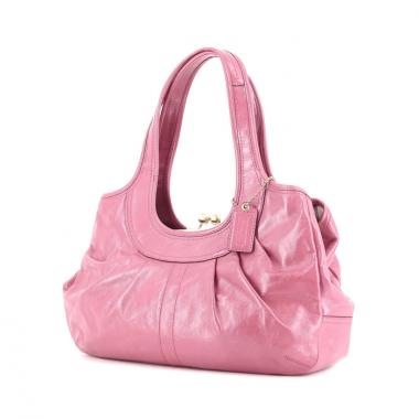 Coach en cuir vernis rose