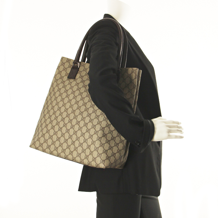 Gucci shopping bag in monogram canvas and brown leather - Detail D1