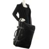 Prada travel bag 60 cm in black canvas and leather - Detail D1 thumbnail
