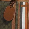 Gucci Travel bag in monogram canvas and brown leather - Detail D5 thumbnail