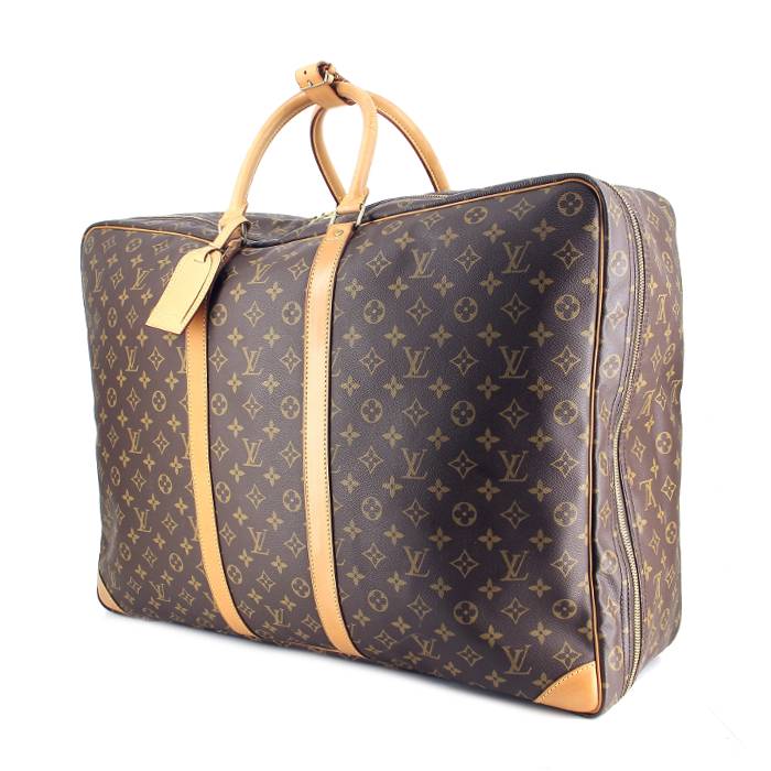 Sac de voyage Sirius 55 en toile monogram Louis Vuitton.