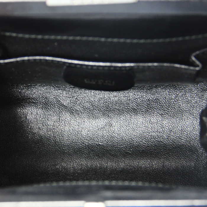 Handbag in zebra patern foal and black leather - Detail D2