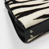Handbag in zebra patern foal and black leather - Detail D3 thumbnail