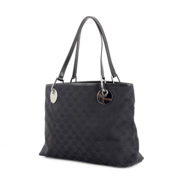 Gucci in black monogram canvas and leather