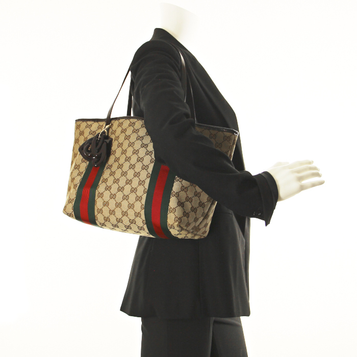 Gucci handbag in beige monogram canvas and brown patent leather - Detail D1