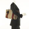 Gucci handbag in beige monogram canvas and brown patent leather - Detail D1 thumbnail