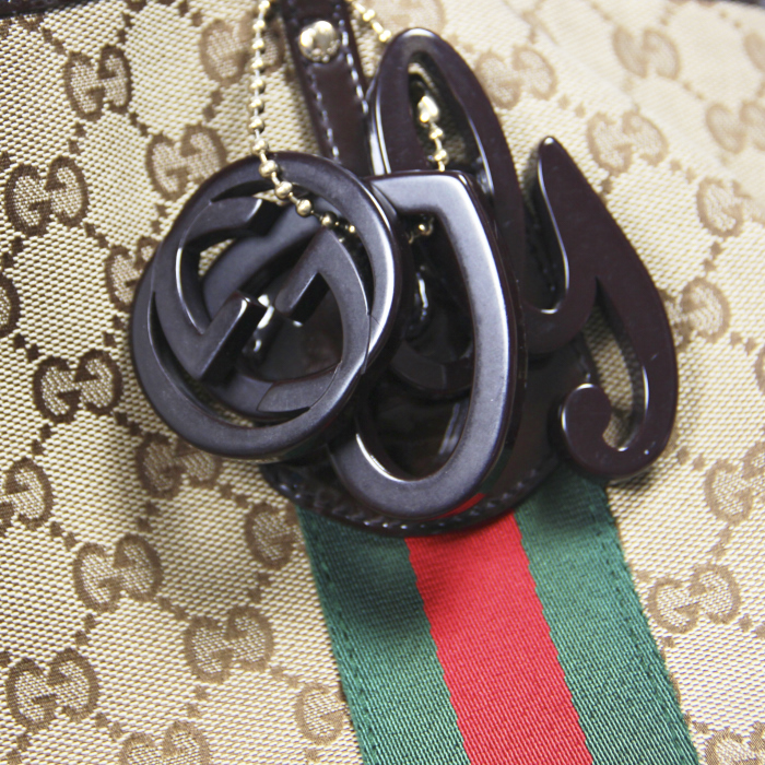 Gucci handbag in beige monogram canvas and brown patent leather - Detail D4