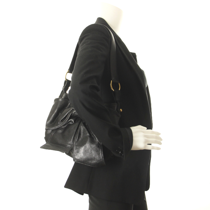 Yves Saint Laurent in black leather - Detail D1