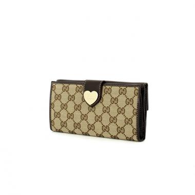 Gucci wallet in beige monogram canvas and brown leather