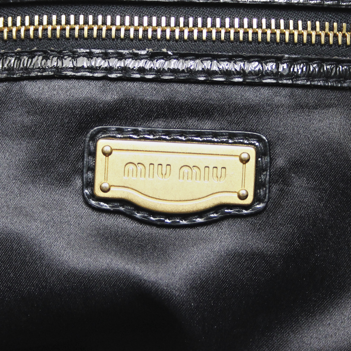 Mui Mui in brown and black varnished leather  - Detail D4