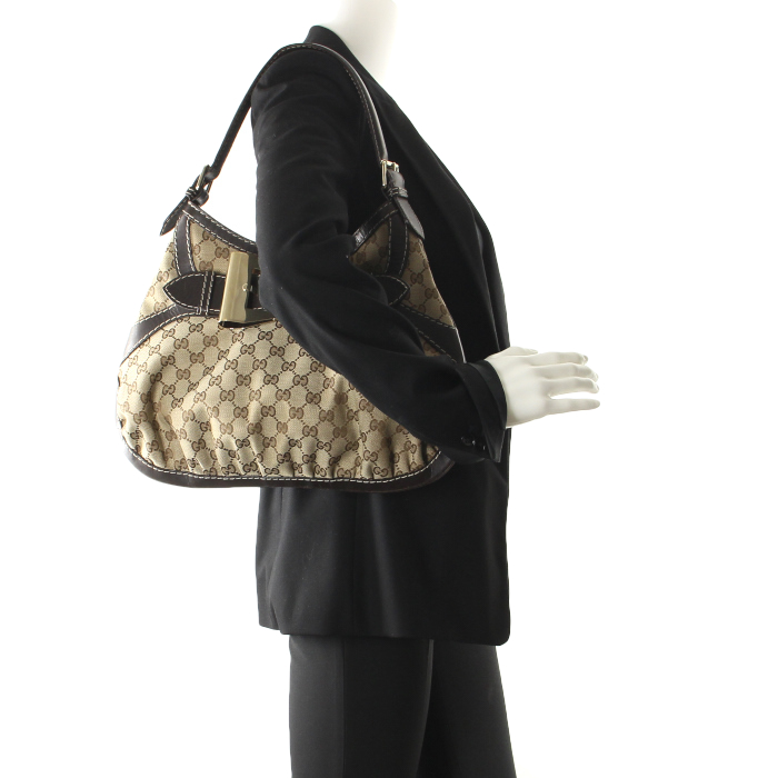 Gucci in brown leather and canvas  - Detail D1