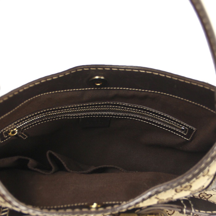 Gucci in brown leather and canvas  - Detail D2