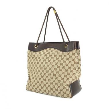 Bolso Cabás en lona Monogram beige y cuero marrón