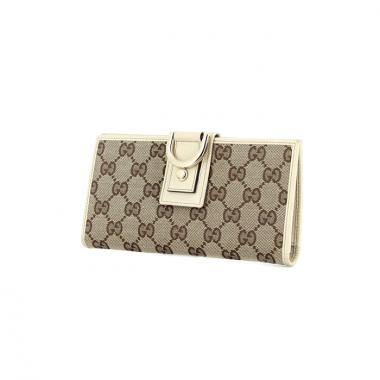 Gucci portefeuille en toile monogram et cuir beige