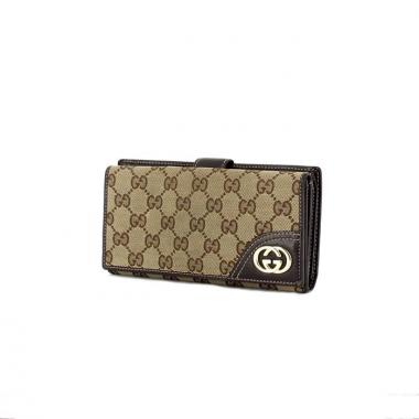 Portefeuille Gucci en toile monogram beige et cuir marron