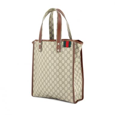 Gucci in beige monogram canvas and brown leather