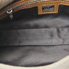 Fendi Baguette handbag in beige canvas and brown leather - Detail D2 thumbnail