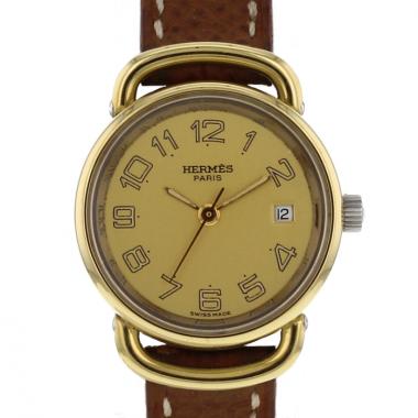 Montre Hermès Arceau en or et acier Vers 1980 