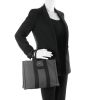Hermes Toto small model Bag in grey canvas and black leather - Detail D1 thumbnail