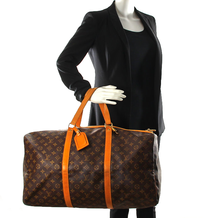 Louis Vuitton Keepall 55 cm in monogram canvas and natural leather - Detail D1
