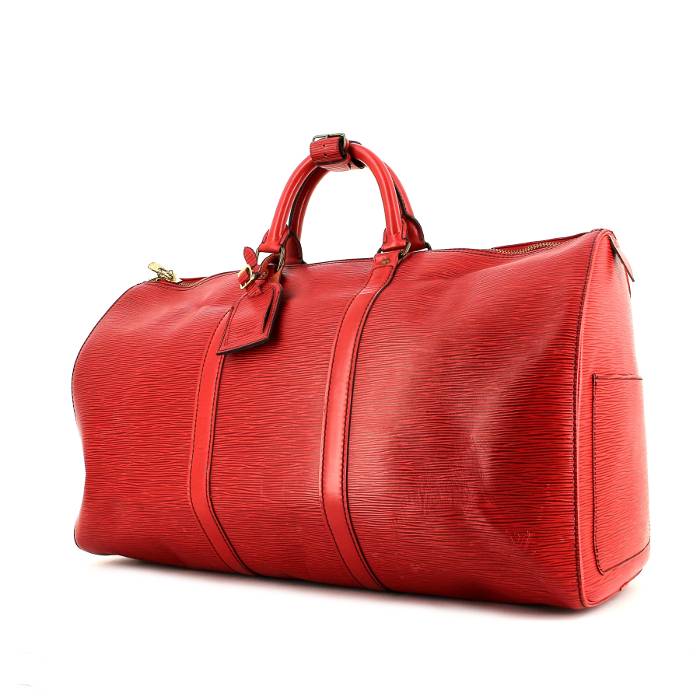 Louis Vuitton Keepall 50 Travel bag in brown canvas and red