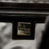 Fendi Baguette Bag in black fur and patent leather - Detail D4 thumbnail