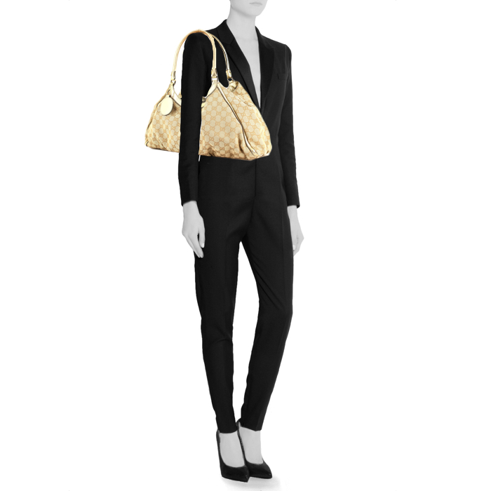 Gucci handbag in beige monogram canvas and gilt leather - Detail D1