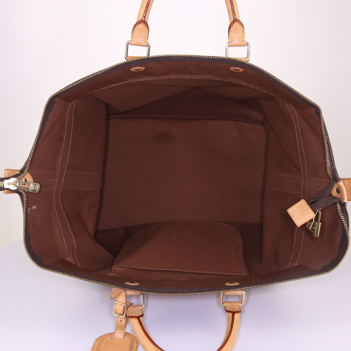 Louis Vuitton Cruiser travel bag in monogram canvas and natural leather - Detail D2