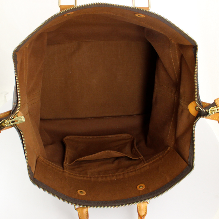 Louis Vuitton Cruiser travel bag in monogram canvas and natural leather - Detail D2