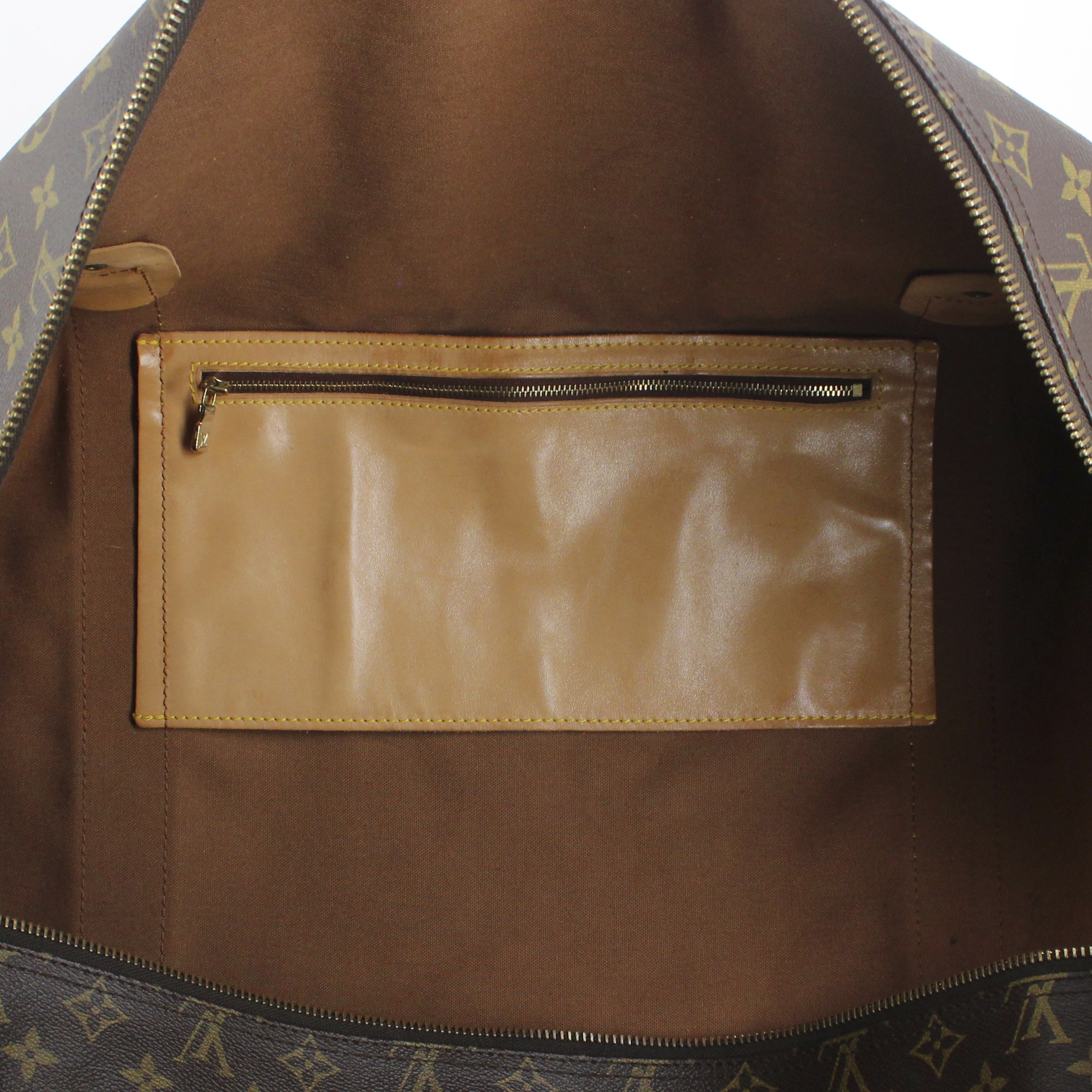 Louis Vuitton travel bag in monogram canvas and natural leather - Detail D4