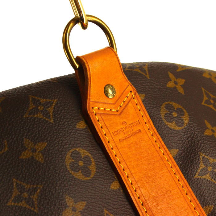 Louis Vuitton travel bag in monogram canvas and natural leather - Detail D4
