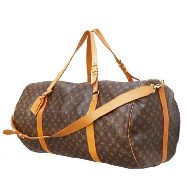 Borsa da viaggio Louis Vuitton in tela monogram e pelle naturale