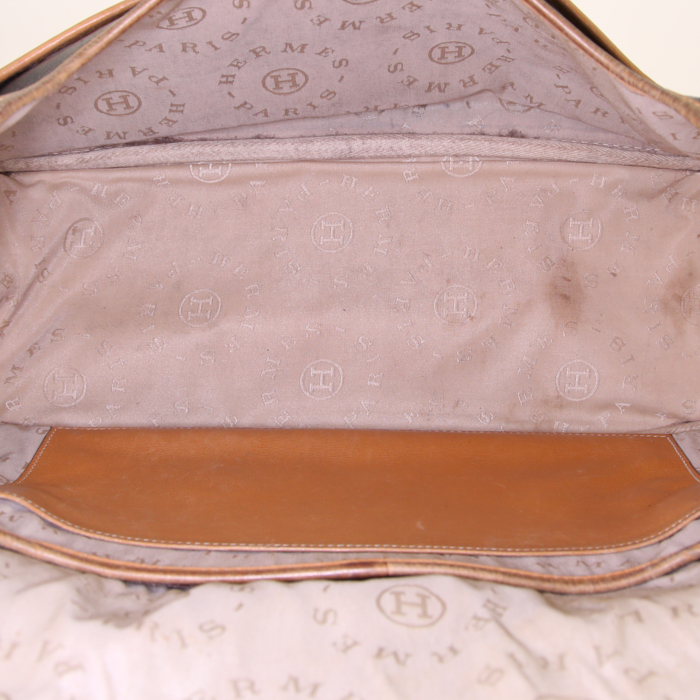 Hermes Nouméa handbag in black and gold leather - Detail D2