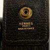 Hermes Nouméa handbag in black and gold leather - Detail D5 thumbnail