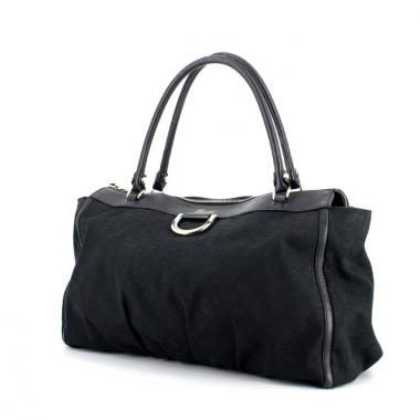 Handbag in monogram canvas and black leather