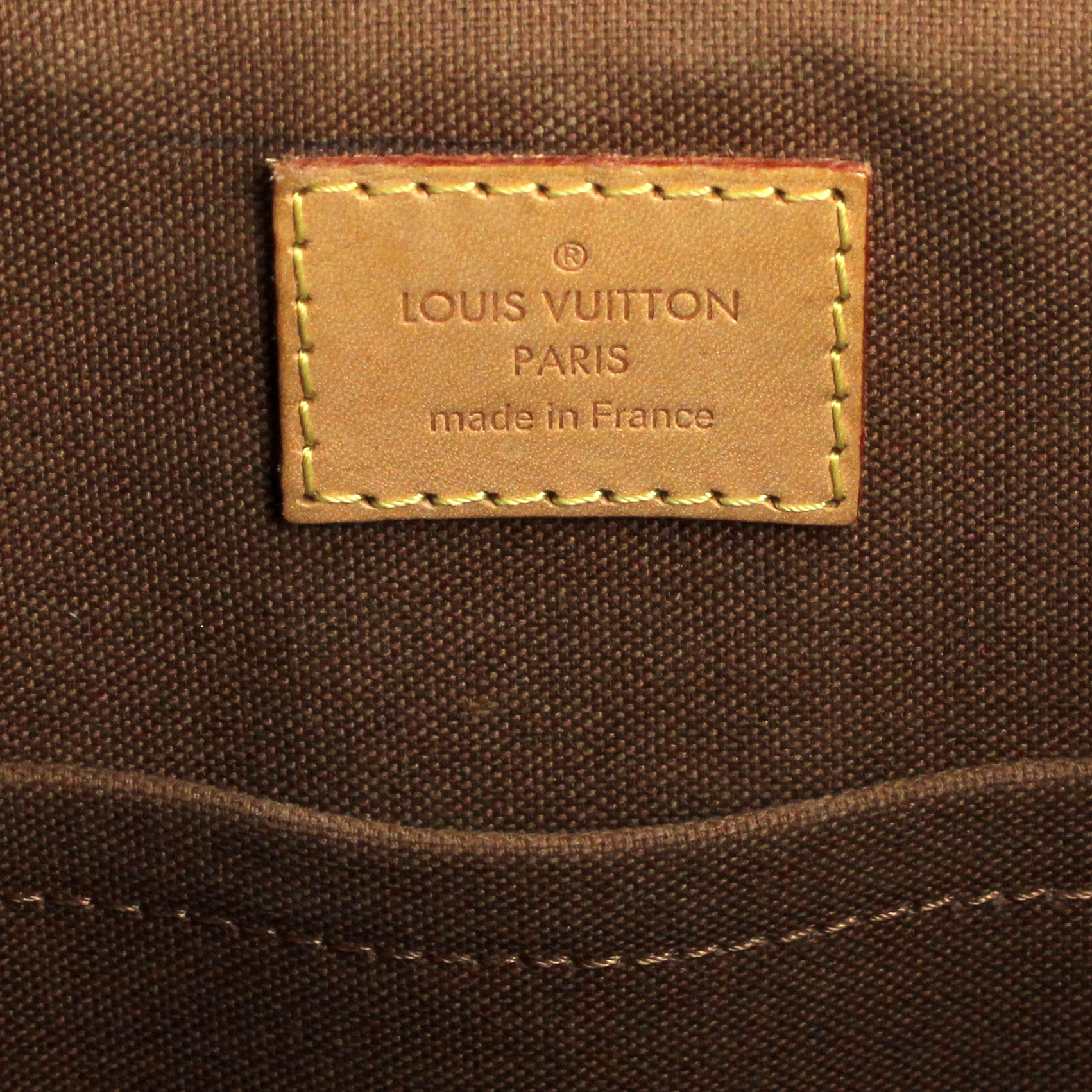 Handbag in monogram canvas and natural leather - Detail D4