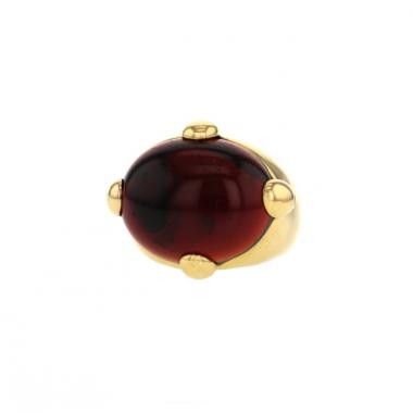 Anello Pomellato in oro giallo e granato rosso ciliegia