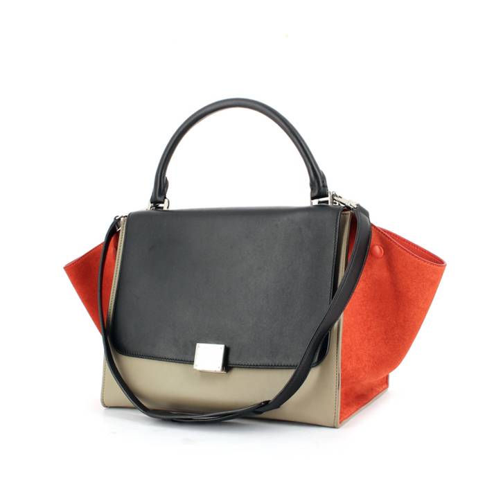 Sac à main Celine Trapeze moyen modèle en cuir tricolore noir et beige et daim rouge