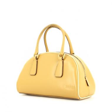 Bolso de mano Prada en cuero marrón y junco beige