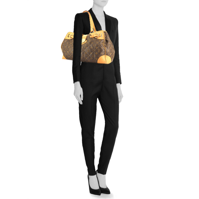 Sac à main Louis Vuitton en toile monogram et cuir naturel - Detail D1