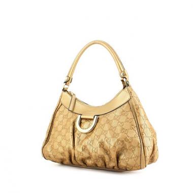 Sac à main Gucci D-ring en cuir monogram doré