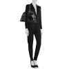 Bolso de mano Yves Saint Laurent Muse modelo mediano en charol negro - Detail D1 thumbnail