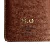 Louis Vuitton wallet in monogram canvas and brown leather - Detail D3 thumbnail