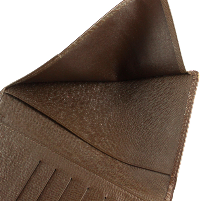 Louis Vuitton wallet in brown taiga leather - Detail D4
