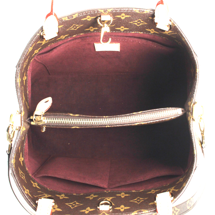 Bolso de mano Louis Vuitton Montaigne en lona Monogram y cuero natural - Detail D3